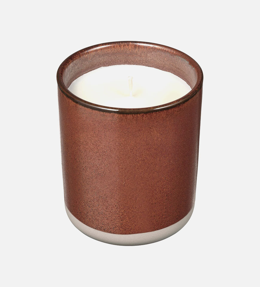Scented candle in ceramic jar